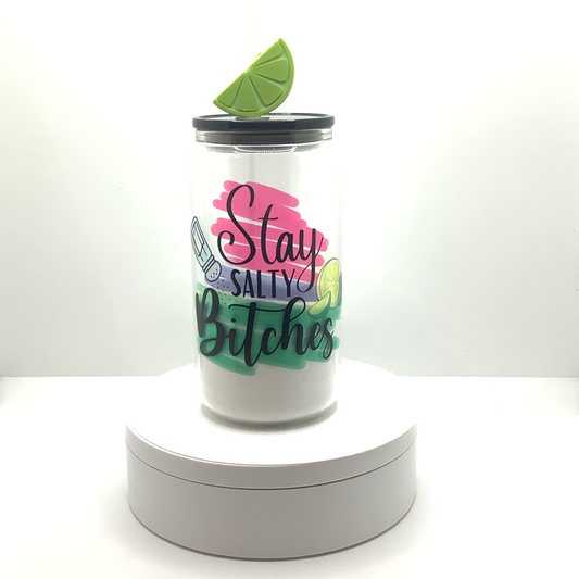 16oz clear snow globe glass can with colorful text, salt shaker and lemon/lime graphic.  Filled with "salt". Black acrylic lid and lime wedge straw topper. 