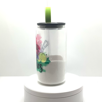 16oz clear snow globe glass can with colorful text, salt shaker and lemon/lime graphic.  Filled with "salt". Black acrylic lid and lime wedge straw topper. 